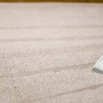 This is a photo of a carpet steam cleaner cleaning a cream carpet works carried out by Abbots Langley Carpet Cleaning