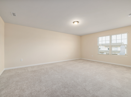 This is a photo of an empty room with cream carpets works carried out by Abbots Langley Carpet Cleaning